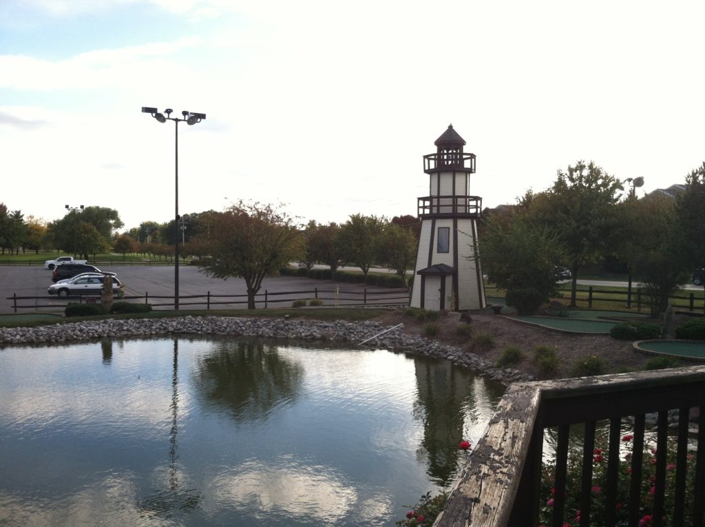 Lovely pond with large lighthouse feature.